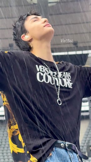 현진 | HWANG HYUNJIN ♡ on Instagram: "He’s enjoying the rain so much, like all his problems disappear under it. It’s as if the rain washes everything away, and for a moment, he’s completely free梁✨ #dominate_paris #hyunjin"