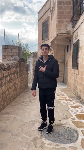 Exploring a Narrow Stone Alleyway in Historical Area