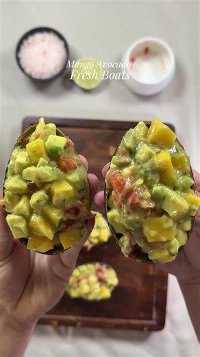 Fresh. Bright. Packed with flavor. These Mango Avocado Boats are a simple but incredible mix of creamy avocado, sweet mango, juicy tomato, fresh parsley, and a zesty lemon-mustard dressing. Everything is chopped into small cubes and mixed together, then served right inside avocado halves for the perfect fresh bite. Light, colorful, and full of texture. 🛒 Ingredients • 2 ripe avocados • 1/2 mango, diced small • 1 tomato, diced • 1 tbsp fresh parsley, chopped • Juice of 1/2 lemon • 1 tsp mustard 