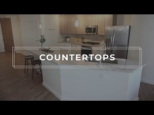 Discover the Allure of Moderno Porcelain Works' Creamy-toned Kitchen in Large-format Porcelain