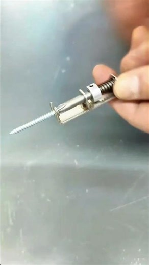 Driving Wood Screws Using a Power Drill and Spring-Loaded Bit Holder on Timber