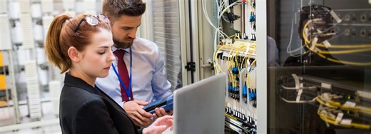 A Look At Booz Allen Hamilton (BAH) Valuation After Defense Spending Proposal And New Tech Partnership