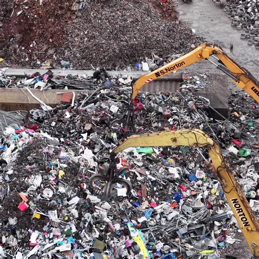 CAT and Liebherr Material Handlers in Action