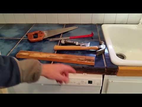 Replacing wood molding around kitchen counter tile