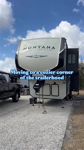 Moving to a cozier corner in the trailerhood… 🎬 Watch us pull up, switch spots, and settle in again. Only hiccup? One slideout refused to budge—hello, future ‘fixer-upper’ project! 🛠️💙 #freerangeadults #trailerlife #bluecollarlife #rvliving