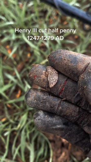 A Henry III hammered silver coin, cut in half to make a halfpenny. During the medieval period, small change was scarce. To solve this, silver pennies were often cut into halves or quarters, creating fractional currency used in everyday trade. This practice was common throughout the reign of King Henry III. Struck in silver in the 13th century, coins like this would have passed through countless hands — used to buy food, pay rents, or settle small debts. Cutting a coin was not damage; it was acce