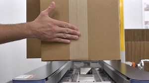 IPG's Interpack CE-10P is an operator-free automatic machine that will form a knocked-down uniform size case, fold the four flaps pneumatically, and, unlike other case erectors, will apply water-activated tape (WAT) to the bottom of an RSC or HSC style case. Cases sealed with WAT deliver the most secure carton closure. Automation, when combined with the packaging security of WAT, increases your profitability. | IPG