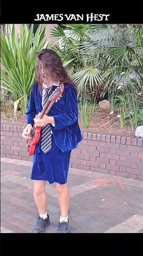 AC/DC - Givin The Dog A Bone by Angus Young Street Performer! (Full Video On My Page)