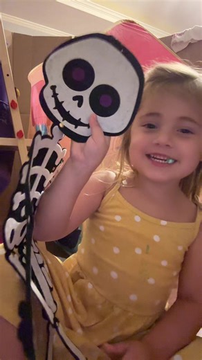 Baby girl loves Skelly and bubble gum 😂 #skeleton #halloween #funny