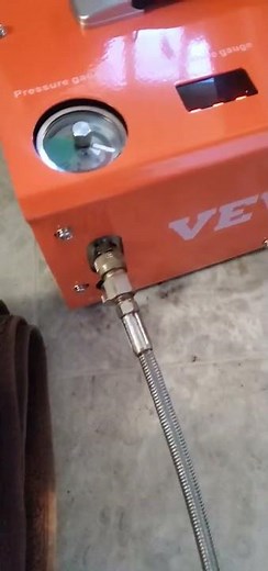 Small High Pressure PCP compressor filling a 2 liter bottle HPA