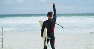 Beach sports, surfing and person with shake sign, hand gesture or greeting for ocean waves, training or sea workout. Surfboard, emoji hello icon and back of surfer freedom, cardio or nature holiday