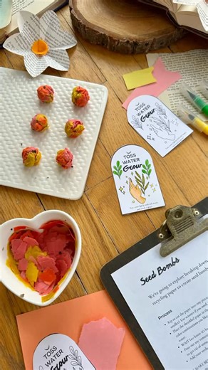 Alyssa Stokes on Instagram: "Seed Bombs 🌈 This is a fun and easy way to create wild flower seed bombs! We used a tutorial from @fortheloveofhomeschooling to create this colorful garden project for spring. My family loves watching things grow! If I was to try this project again, I would suggest blending the soaked paper and water to create a finer pulp before adding the seeds."