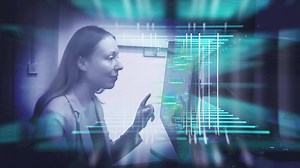 A woman interacting with computer system