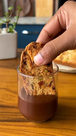 Nikita Varma Chef/Foodblogger on Instagram: "These Whole Wheat Almond Biscotti are studded with bright orange zest, chewy cranberries, and crunchy pistachios—every bite is packed with flavour and texture. Lightly sweet, beautifully crisp, and incredibly satisfying, they pair so well with your evening coffee or a warm cup of tea. Baked to perfection and made with whole wheat, this is indulgence that feels just right. 🍊🌰💚"