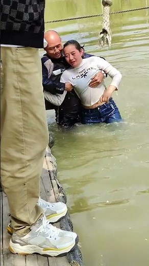 Woman wear boots in water
