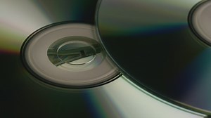 Two CD discs close up rotating - Free Stock Video