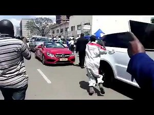 Ginimbi funeral convoy in Harare, exclusive luxury cars.