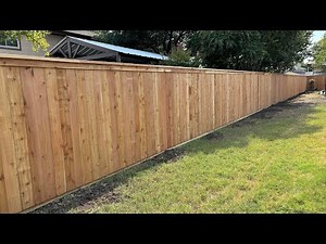 Cap and trim cedar fence build