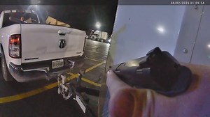 Cops engage in shooting standoff on highway