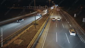 City traffic in Cologne, Germany at night illuminated highway