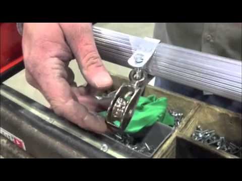 How to replace a pulley on an extension ladder