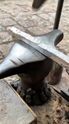 Pouring molten iron ore into a mold to form decorations and useful tools #molding #ironwelding