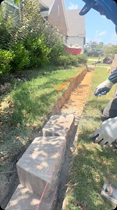 Flowerbed renovation using retaining wall blocks with copping #construction #constructionlife #landscaping #landscaper #landscapedesign #fyp #fypage #fypシ | Rostro Landscapes
