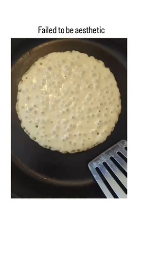 @unstoppablelaugh_ on Instagram: "The video depicts a home cook attempting to flip a pancake that tears apart due to insufficient binding in the batter, a common issue from low fat content or excessive heat, as explained in basic culinary science from sources like the Journal of Food Science. Posted by @brielleeloo on February 3, 2026, it quickly amassed 2.3 million views and 3,100 likes, underscoring the broad relatability of everyday cooking fails in social media trends. Thread replies offer h