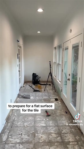 Happy wife = happy life! Grouting now, and installing trim on doors, doing baseboards and furnishing tonight! Can't wait to show the final results! #DIY #roomremodel #sunroom | Nik and Liv DIY