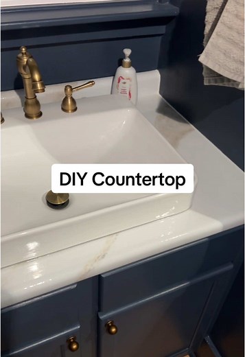 I painted this laminate countertop using an epoxy kit and I love how it turned out! Lmk if you have questions! FYI this kit will actually do 35 square feet so I only used a bit of it and have leftovers for other projects, but you could even do a kitchen! #countertops #giani #diyprojects #countertop #bathroommakeover