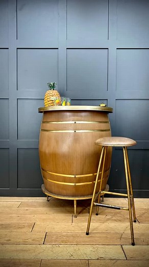 This mid century barrel cocktail bar is the ultimate party starter....