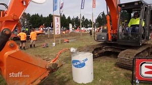#Watch: New Zealand's top excavator operators have been put to the test in the national champs, pouring cups of tea, carrying eggs and popping corks off wine bottles. | Stuff