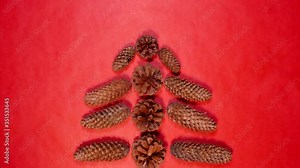 Merry Christmas stop motion logo. Christmas tree from pine cones animation 4K