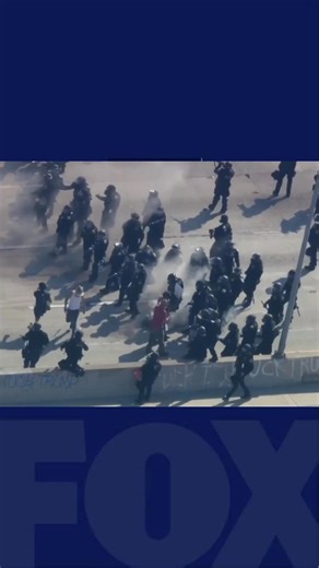 Protesters and law enforcement kick an active gas can at each other "like a game of soccer" on a Los Angeles Freeway. MORE⬇️ | FOX 11 Los Angeles