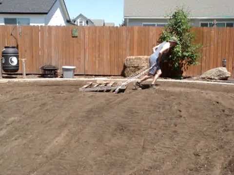 Leveling out the ground, the ole fashioned way