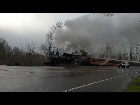 Mount Rainier Scenic Railroad Steam Train Departing Elbe Station with Road Crossing