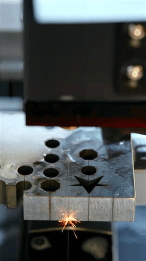 clip-3969670215-industrial-laser-cutting-metal-part-on-cnc