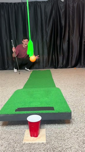 This impossible mini golf trick shot took forever to drop