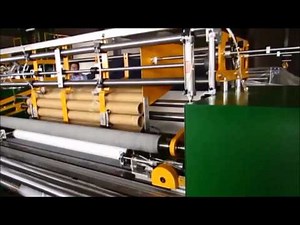 Jumbo Roll to Roll Re winder with Shaft less Core Changing System