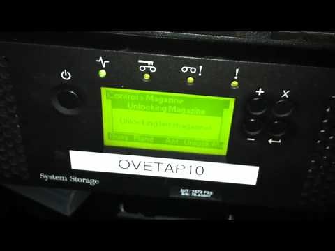 How to open left magazine on IBM ts3100