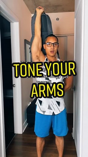 Add more resistance to your arm workout using a backpack! #beginnerworkout #armworkout #tonearms #homeworkout #noequipment