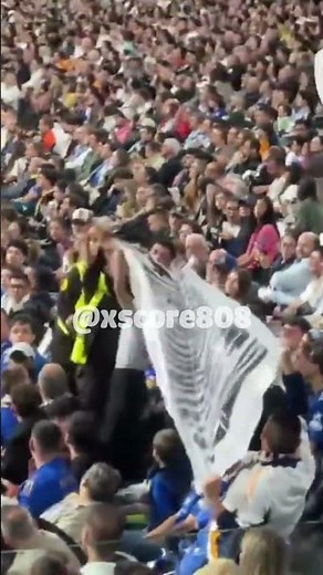 Real Madrid president argues with fans in the stands