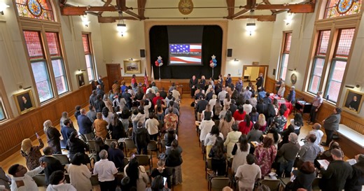 Trump has a welcome message for new citizens. It's different from past presidents