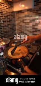 Engaging cooking scenes showcasing impressive skills and delightful food preparation in a modern kitchen Stock Video Footage - Alamy