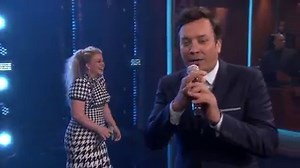 Jimmy and Kelly Clarkson take turns singing as many songs as they can to a random beat in Beat Battle. | The Tonight Show Starring Jimmy Fallon