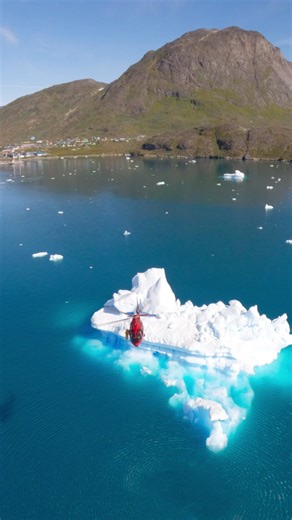 Setting up a hover shot next to an Iceberg in the South of Greenland close to Narsaq. #gopro #photographer #helicopter | Lloyd H Photography