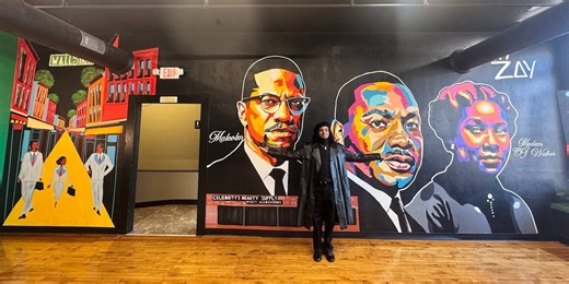 Artist brings civil rights history to life with Davenport business mural
