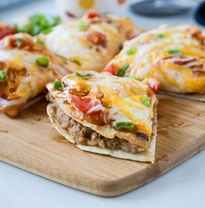 1.9M views · 9.1K shares | Mexican Pizza – a homemade version of the famous Taco Bell Mexican Pizza, only better! Super easy and a fun dinner the whole family will love. Get the Recipe - https://dinnersdishesanddesserts.com/mexican-pizza/ | Dinners, Dishes and Desserts | Facebook