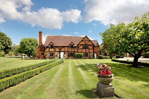 A 15th century country house with walled gardens and a pool is for sale in Windsor