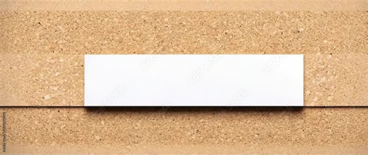 Empty horizontal white paper strip placed across textured natural cork board surface